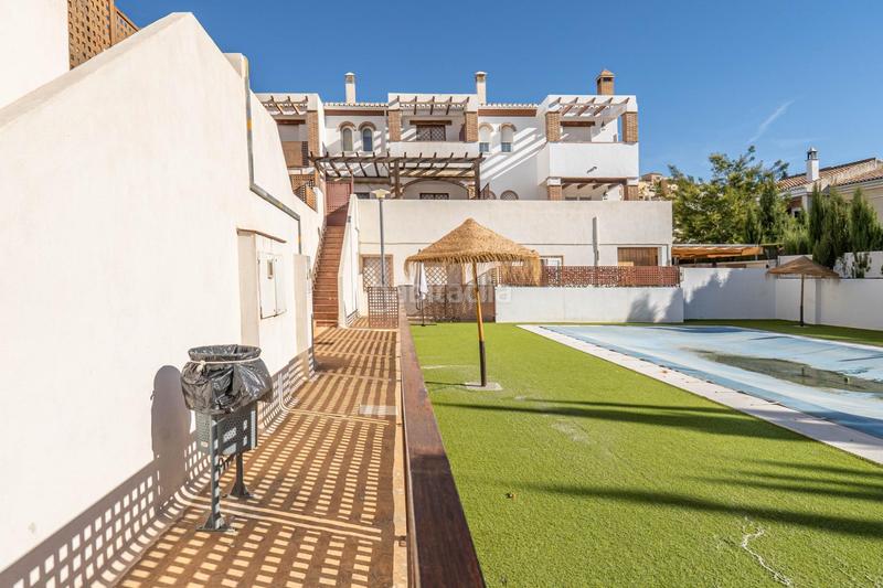 Foto c192803c-6f62-48aa-81ed-597b03c26ef6. Casa aparellada amb calefacció aparcament piscina a Granada