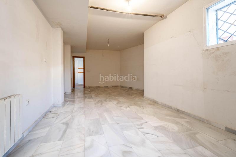 Foto df0e4153-6b9d-44e4-af87-8c8777d0df34. Casa aparellada amb calefacció aparcament piscina a Granada