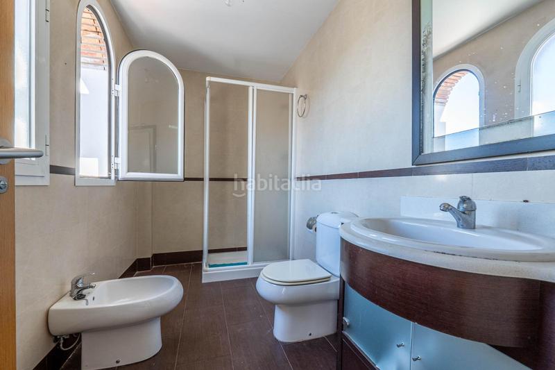 Foto df3b72ec-4944-4ed4-b6c7-5f4dca3f8f6b. Casa aparellada amb calefacció aparcament piscina a Granada