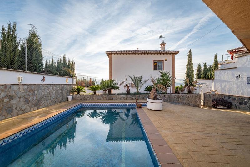 Foto ec32c7d7-eef4-4d41-92f8-d6ffa77dd98c. Chalet with parking in Huétor Vega