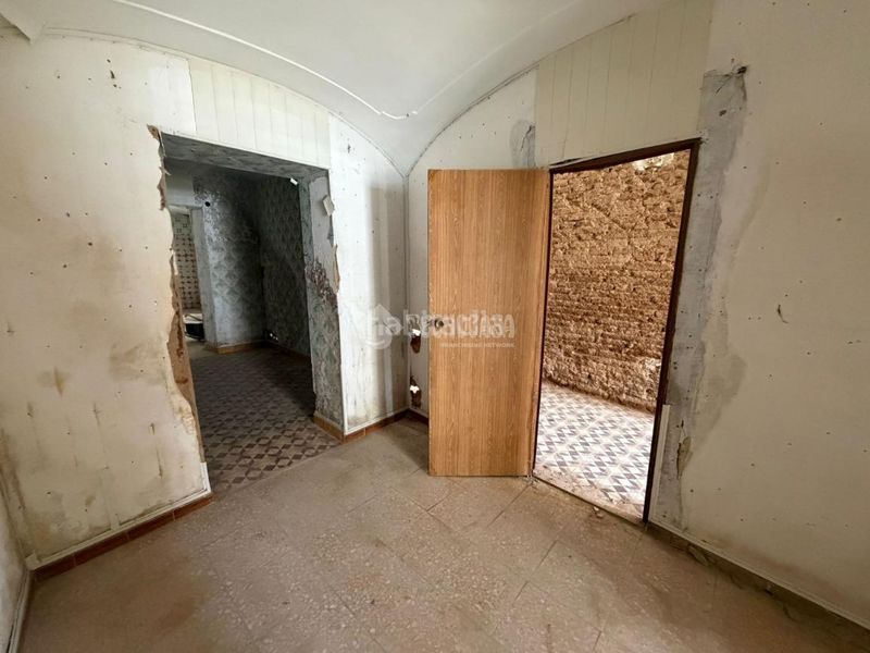 Foto c6dd5eb7-f06b-49e1-89af-04deb4f413e5. Casa aparellada a Montijo
