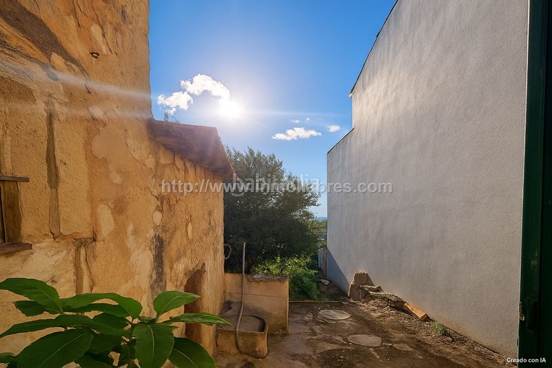 Foto de40c664-f365-4fad-b2f9-518010ebeb7c. Masia amb aparcament a Campanet