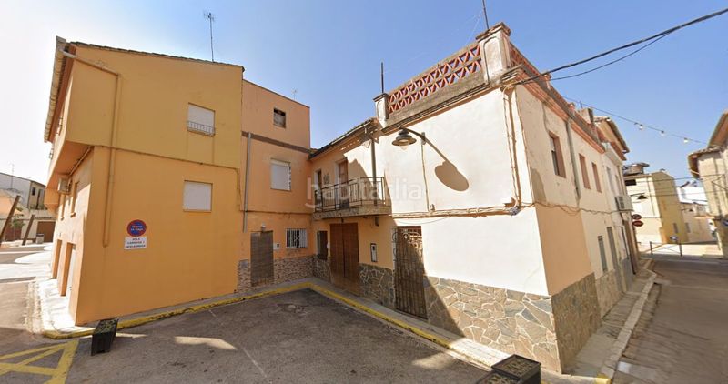 Foto c6d860b9-b6e6-43b1-9947-88cf9dd65a9f. Casa adossada a iglesia 3 a Senyera