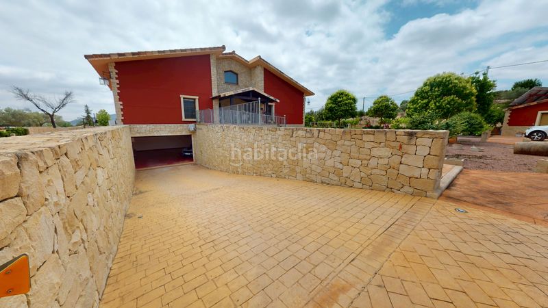 Foto 67b5f459-fb74-41c9-a666-c5c25f58eb3f. Xalet amb xemeneia calefacció aparcament piscina a Monòver