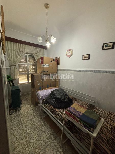 Foto 1c7fe6e2-3829-4505-bd3b-67309eb1b196. Casa aparellada a Centro Puertollano