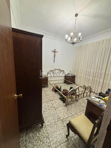 Foto b0373872-425a-46c9-be94-5b48595bbdb7. Casa aparellada a Centro Puertollano