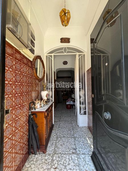 Foto bcad20b4-4956-4e6a-a8af-88930c8dd0b4. Casa aparellada a Centro Puertollano
