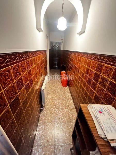 Foto b1199506-59db-48c7-9fd4-b3f0c4ed574f. Casa aparellada amb calefacció a Centro Puertollano