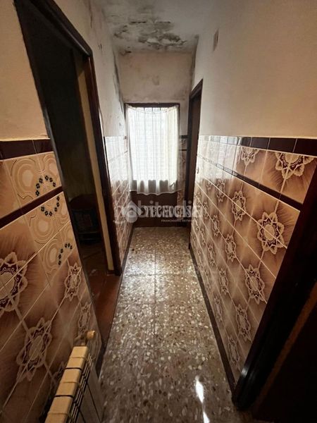 Foto c157c03e-a14f-42b3-a79a-66e844401551. Casa aparellada amb calefacció a Centro Puertollano