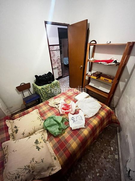 Foto c8533e9c-832c-440b-bf30-df6b3a0fd731. Casa aparellada amb calefacció a Centro Puertollano