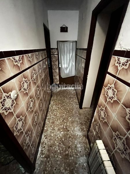 Foto f63c8d6e-3fe6-40ad-8aa0-c184239d3c4d. Casa aparellada amb calefacció a Centro Puertollano