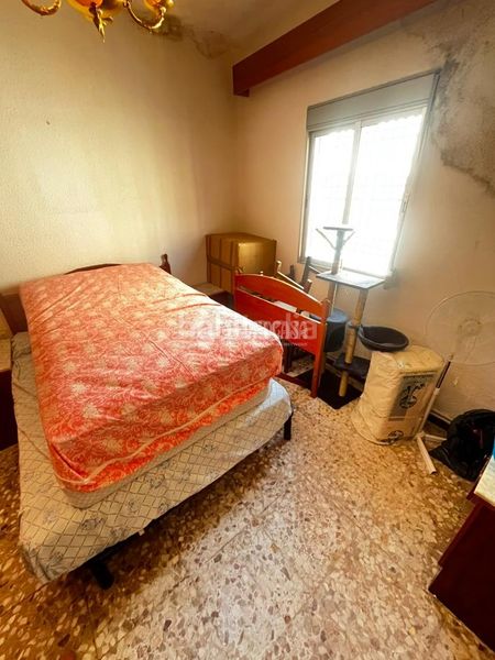 Foto 8a0f473f-13a6-4ee7-86a5-2f5407511524. Casa aparellada a Centro Puertollano