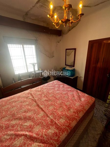 Foto c1ca743d-a1e8-4882-8df4-8f5ad03f37cc. Casa aparellada a Centro Puertollano
