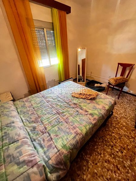 Foto f0ae45a0-a363-4ec1-b8e8-aa14a76981d1. Casa aparellada a Centro Puertollano
