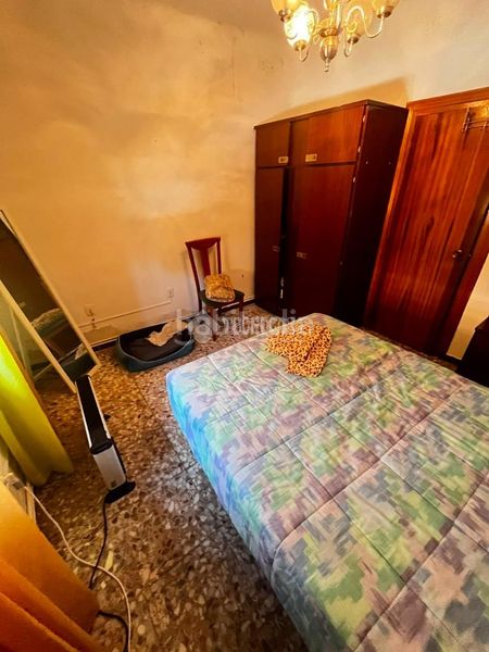 Foto fbeb50c1-2ca4-4cdb-9c93-9c7ca5e78035. Casa aparellada a Centro Puertollano