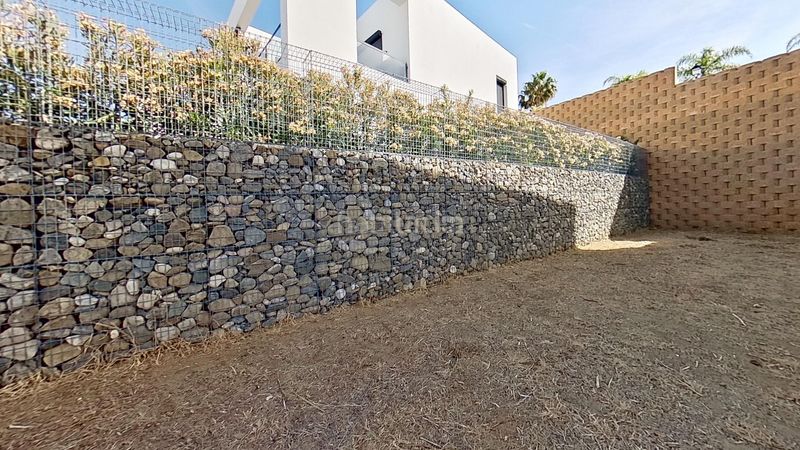 Foto 352cf4a0-ca85-4e6b-9be4-8105a9f8f88c. Casa amb aparcament a Riviera del Sol Mijas