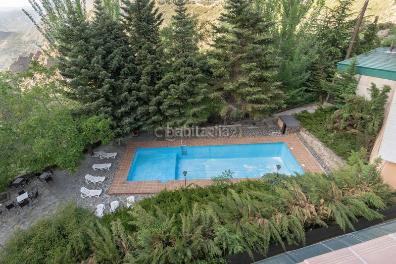 Foto 2aa6879f-f834-41c9-8f4a-57a67307df81. Edifici amb piscina a Zona media Sierra Nevada
