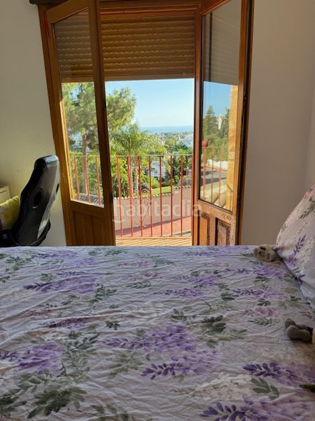 Foto 5c54027c-dced-4357-bfd8-41dbce43806d. Casa aparellada amb aparcament piscina a Calahonda Mijas