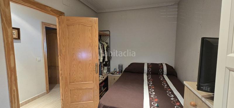 Foto 1999e82a-2298-4ac0-94b5-61ffecda0c58. Casa amb calefacció a El Poblado - Abulagar Puertollano