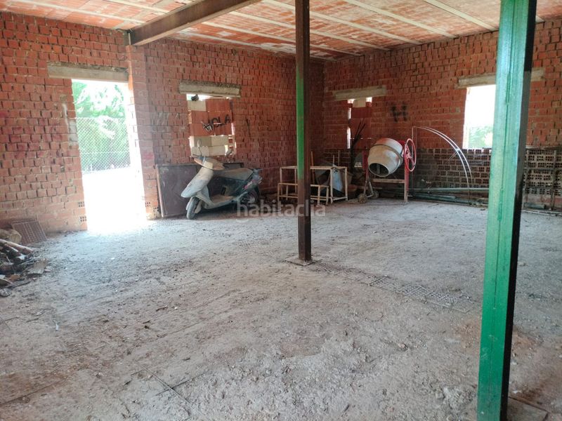 Foto 98814394-d4c8-4e78-983c-eb92adb9509d. Casa amb piscina a PAU 2-600 Puertollano