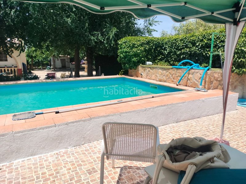 Foto e38fe66a-7b62-475a-ac0a-5fbedafe1416. Casa amb piscina a PAU 2-600 Puertollano