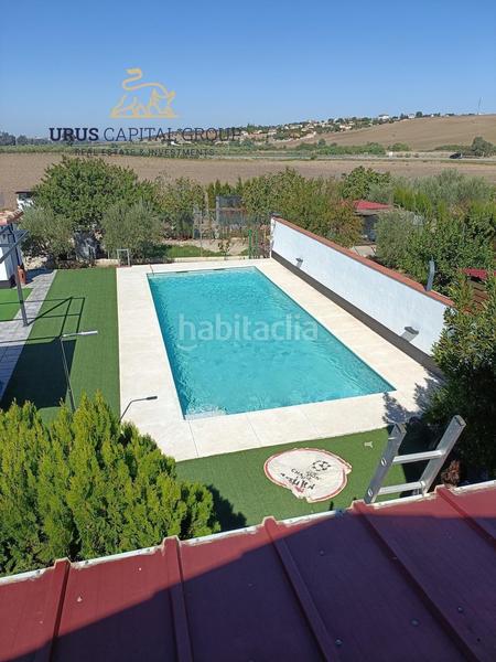 Foto 39a96c9d-47b7-4968-b55f-88db38cd8d3c. Chalet exclusiva casa independiente con jardín, piscina y huerto en la carlota, córdoba en Carlota (La)