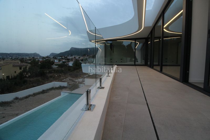 Foto d37b1d4b-124e-463b-b53f-61bfb8f5ca10. Chalet avec chauffage parking piscine dans Pueblo Calp
