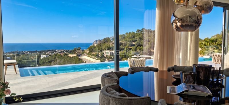 Foto bc964367-efe8-4013-b9eb-b9ac3c2c97d8. Chalet avec chauffage parking piscine dans La Fustera Benissa