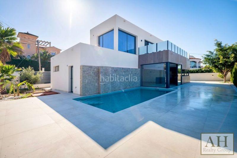 Foto ef31f6ff-87c3-48f3-bfd6-618029237106. Casa con parcheggio in L´Albir Alfàs del Pi (l´)