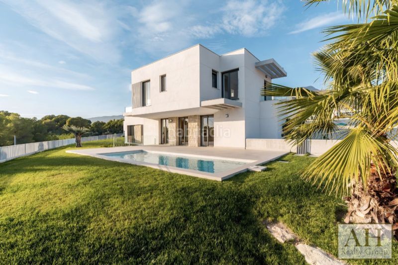 Foto becc44c5-8c44-436d-915b-ee2db8fc1f7a. Casa amb aparcament a Golf Bahía Finestrat