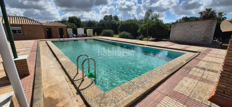 Foto aae0806d-e2ce-47ff-9a3b-060ab6361711. Xalet amb calefacció aparcament piscina a Carmona