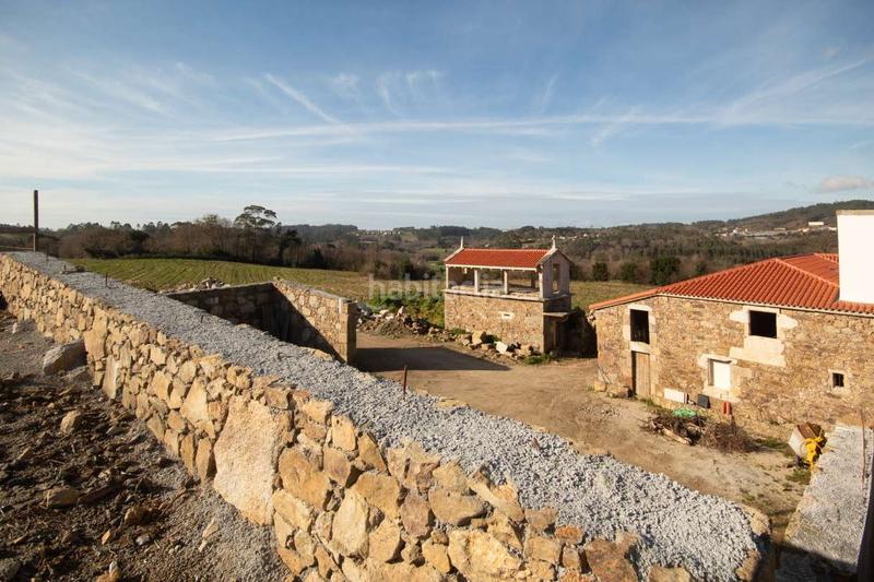 Foto c11b7e03-6fdc-4bd8-af34-5f184036ac51. Chalet avec parking dans Laracha