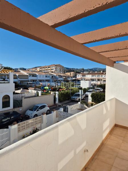 Foto 0fead51c-0cde-4f9c-9eac-c9b62ec00848. Casa a schiera con camino parcheggio piscina in Torre de Benagalbón Rincón de la Victoria