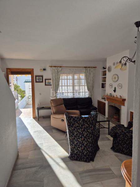 Foto 5ddd1156-d820-4f1b-9e23-9dc342a0ea1e. Casa a schiera con camino parcheggio piscina in Torre de Benagalbón Rincón de la Victoria