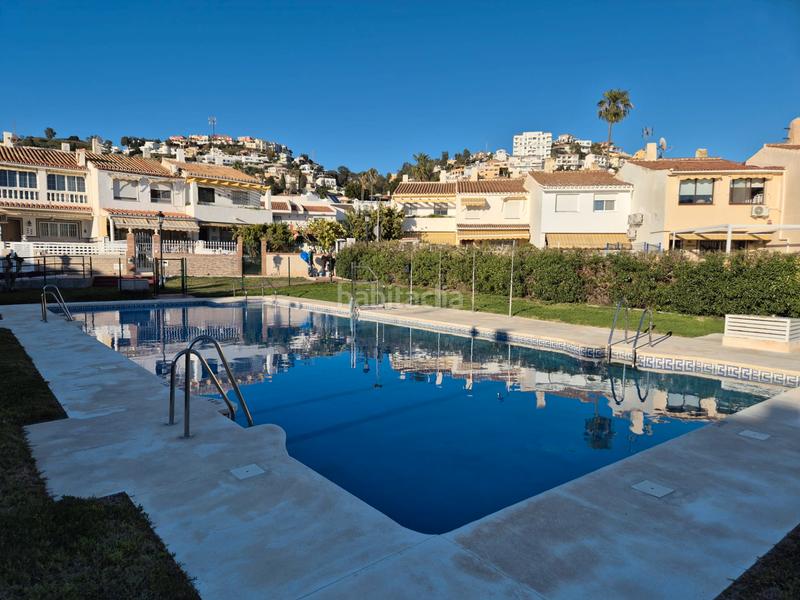 Foto a63e06f7-9f99-4c41-aa29-2ddfec4efdf7. Casa a schiera con camino parcheggio piscina in Torre de Benagalbón Rincón de la Victoria