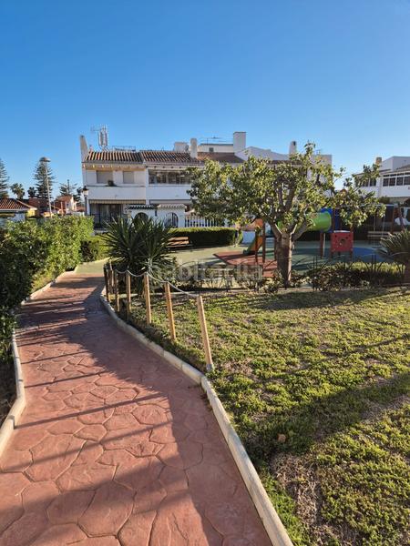 Foto b3e2fa59-22a1-4c89-8a27-3e298406d468. Casa a schiera con camino parcheggio piscina in Torre de Benagalbón Rincón de la Victoria