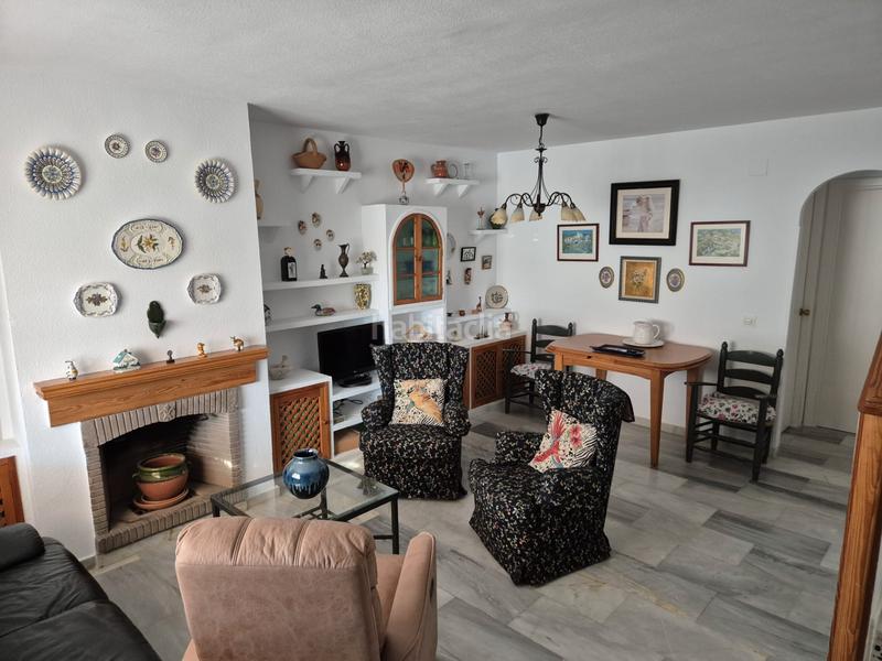 Foto bd63e985-5f37-4c12-9755-3ac019affc8a. Casa a schiera con camino parcheggio piscina in Torre de Benagalbón Rincón de la Victoria