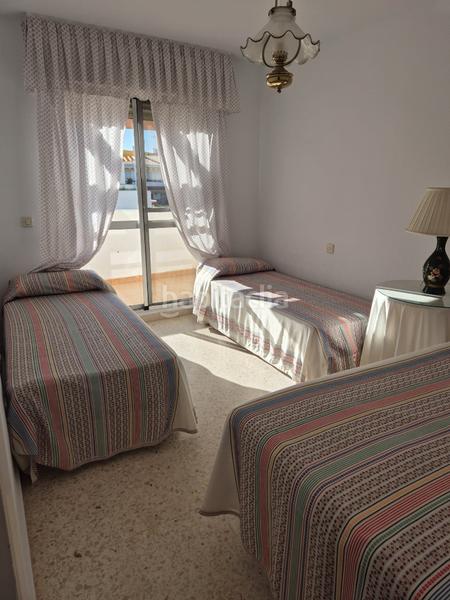 Foto bf9eabe7-822f-40bc-be04-3dd33cb89639. Casa a schiera con camino parcheggio piscina in Torre de Benagalbón Rincón de la Victoria