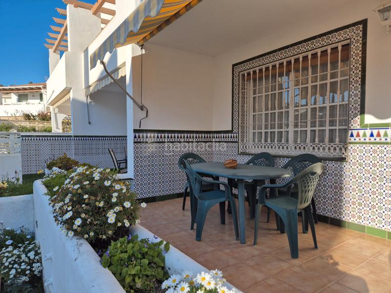 Foto fe8dccd3-3cc6-4fb8-82f9-59c8d7d23e89. Casa a schiera con camino parcheggio piscina in Torre de Benagalbón Rincón de la Victoria