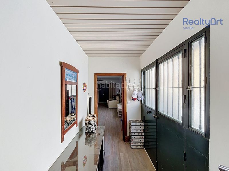 Foto 537fd688-1277-4101-85cc-cc87c18d6141. Casa amb aparcament a Bellavista Sevilla