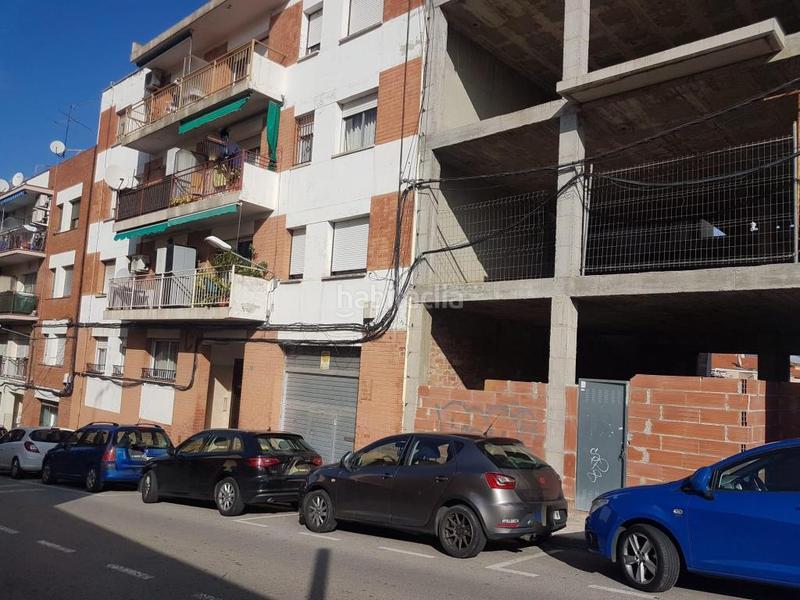 Foto b40f232c-f189-48b5-824a-0a23dd58d6fd. Casa adossada a Nucli Urbà Esparreguera