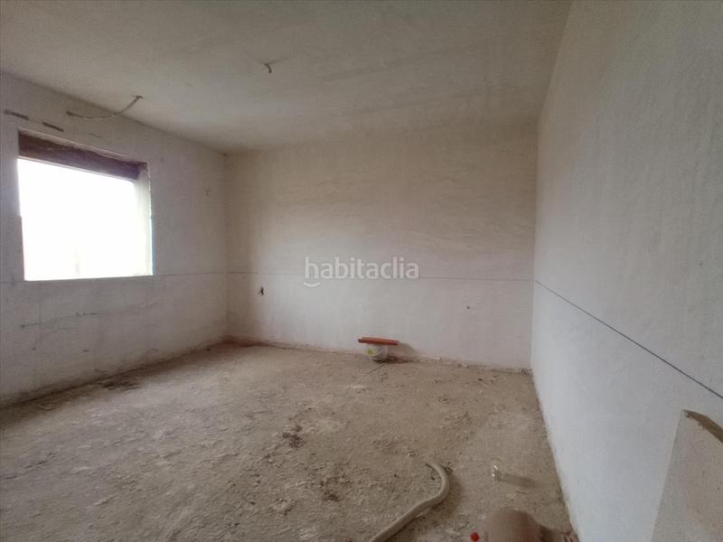 Foto 0fd2fda0-bbbb-49c6-81e6-687d27c354e3. Casa adossada a Cala