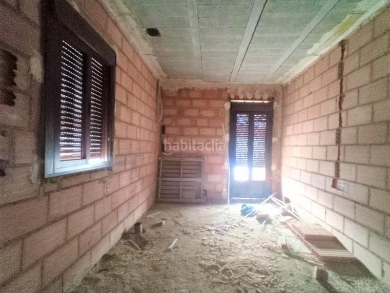 Foto 445ce1e8-c47a-4b89-b8bc-b3d7f3198e38. Casa adossada a Cala