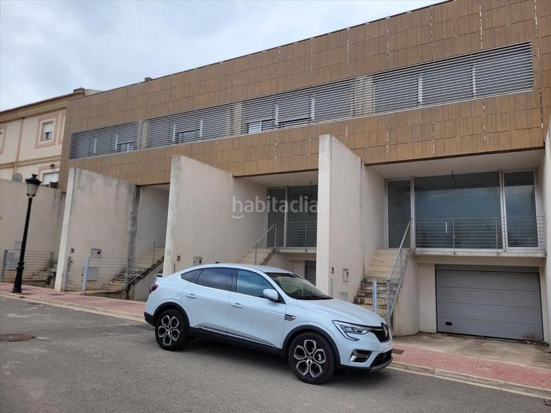 Foto 053e827d-c9c0-4def-807b-1cc4765fcbc0. Casa a schiera con parcheggio in Lugar Nuevo de Fenollet