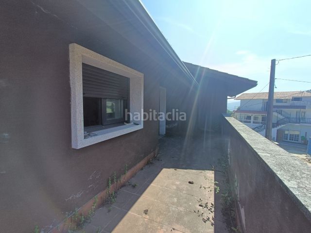 Foto a4f56e13-40f4-4c81-859a-f48713cbca26. Casa amb aparcament a Vilaboa