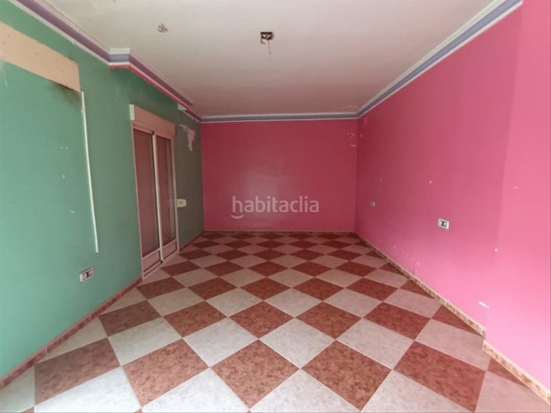 Foto f948c52c-4851-4ec6-a469-92984fc40b8c. Casa adossada a Pinos Puente