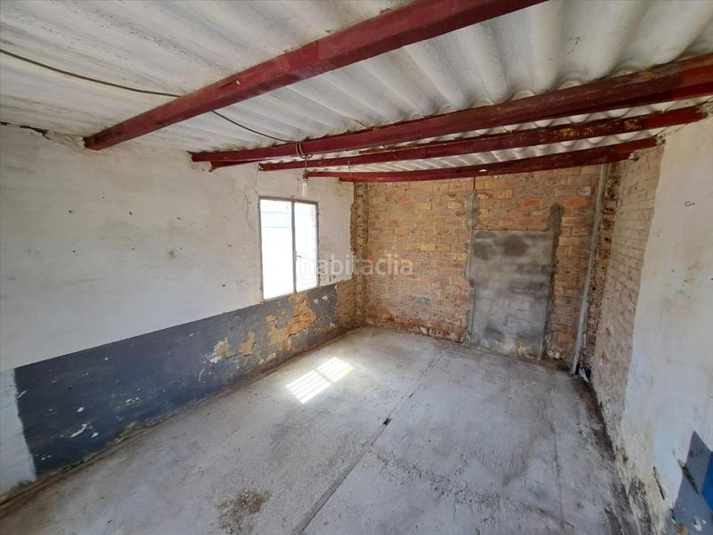 Foto 23dc884e-21ca-4dab-8054-e7fbfc2037ee. Casa amb aparcament a Bonares