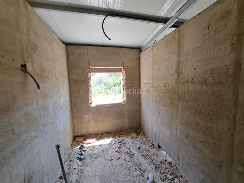 Foto ad502d62-04d8-44f1-a69d-813fb87014c0. Casa amb aparcament a Bonares