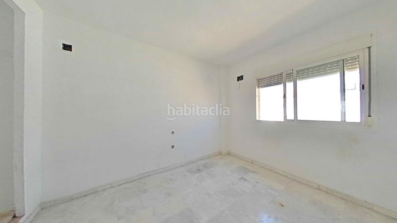 Foto 53a7fa84-d06d-479e-bd3b-da5ef8b407dd. Casa adossada amb calefacció a Espartinas pueblo Espartinas