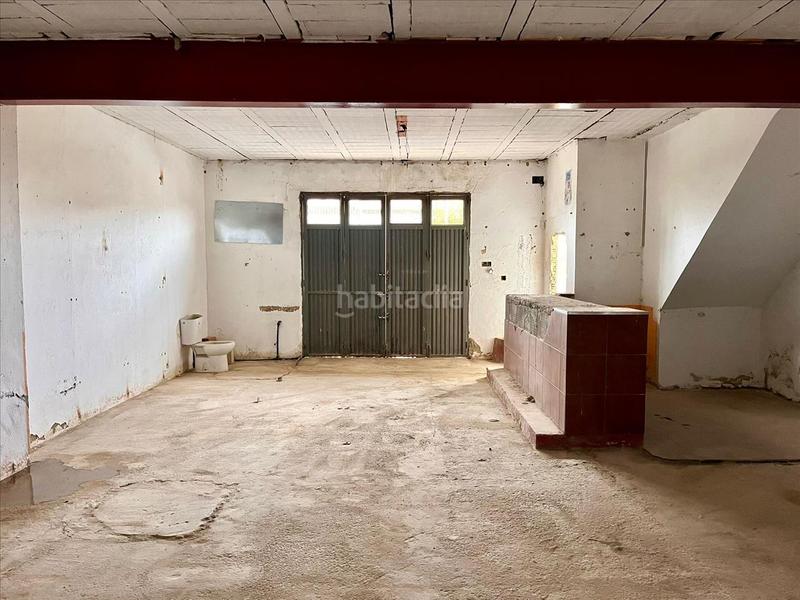 Foto a22bbade-b910-46aa-9fc3-e4216a61cb6f. Reihenhaus in Morón de la Frontera